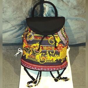 NWOT GIANNI VERSACE BLACK & MULTICOLOR BAROQUE DRAWSTRING BACKPACK WITH DUSTBAG
